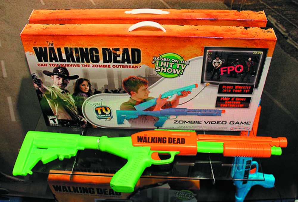 JUN121834 - WALKING DEAD PLUG-N-PLAY TV GAME - Previews World